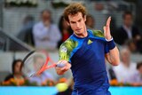 Andy Murray plays a shot against Tomas Berdych at the Madrid masters