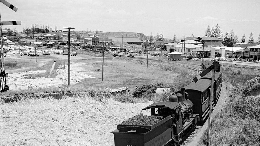 A train heads towards Tweed Heads on the old South Coast rail line.