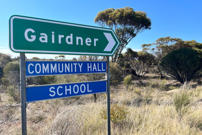 a road sign that reads Gairdner