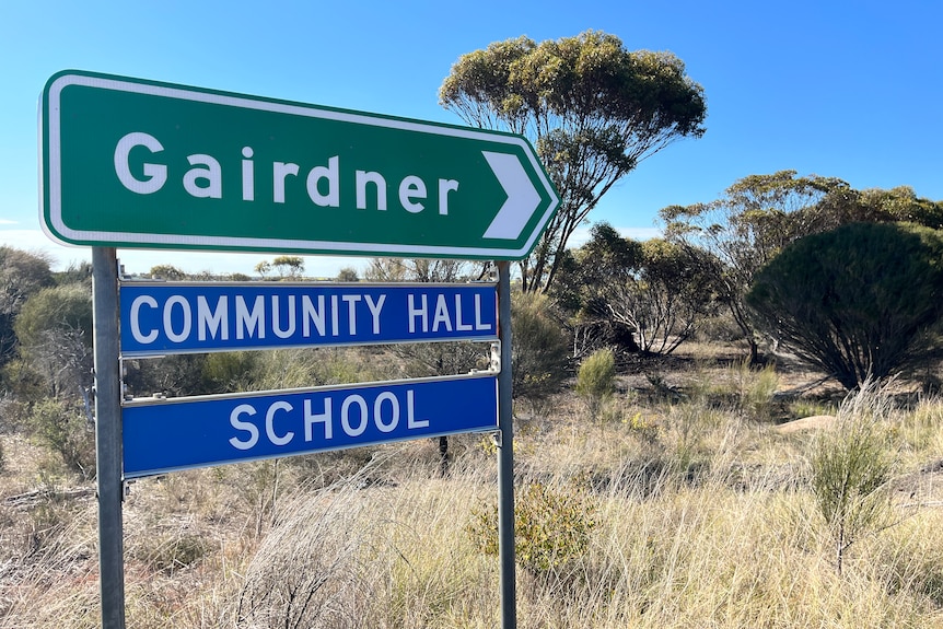 a road sign that reads Gairdner