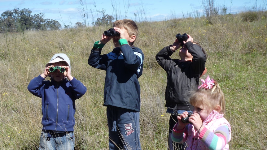 A group of young birdwatchers take part in the fourth annual birdwatching event at Coal and Allied's Bengalla mine.