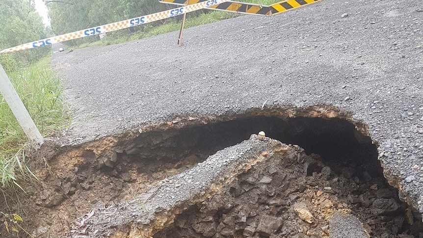 damage to road after flash flooding on the Swan Bay-New Italy Road