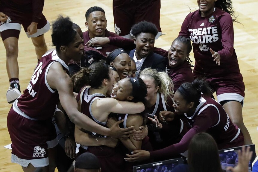 Mississippi State players celebrate win over Connecticut