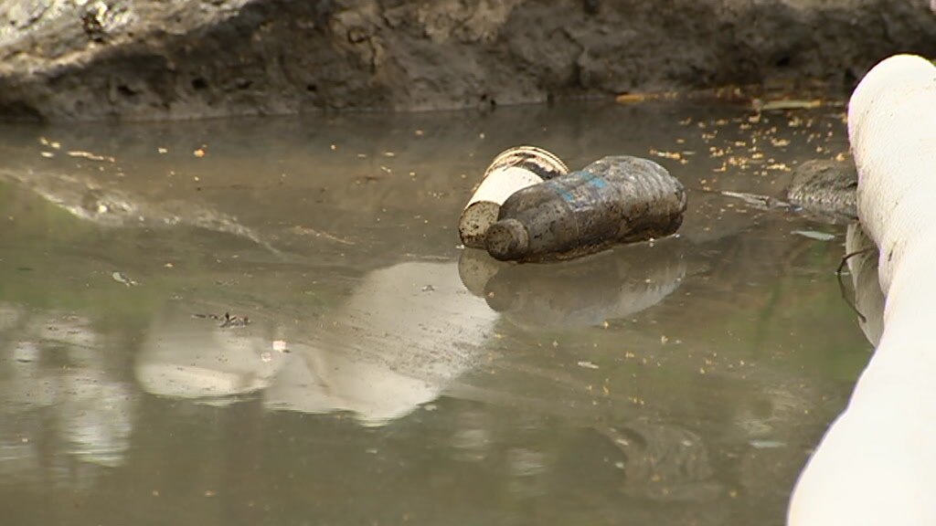 Stony Creek in Melbourne's west running red as authorities investigate