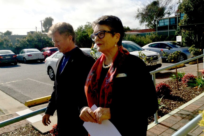Adelaide's Vicar General Father Philip Marshall and Catholic Education SA director Helen O'Brien