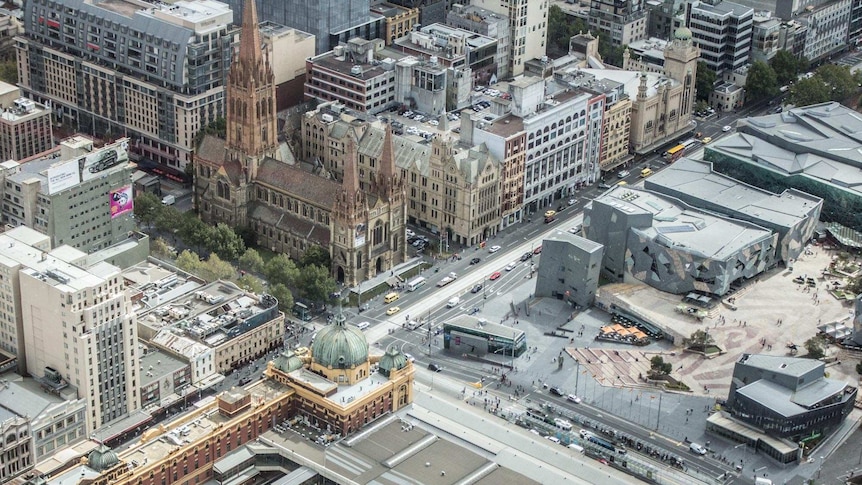 Aerial shot showing Melbourne's Flinders St Station, Federation Square and St Pauls Cathedral