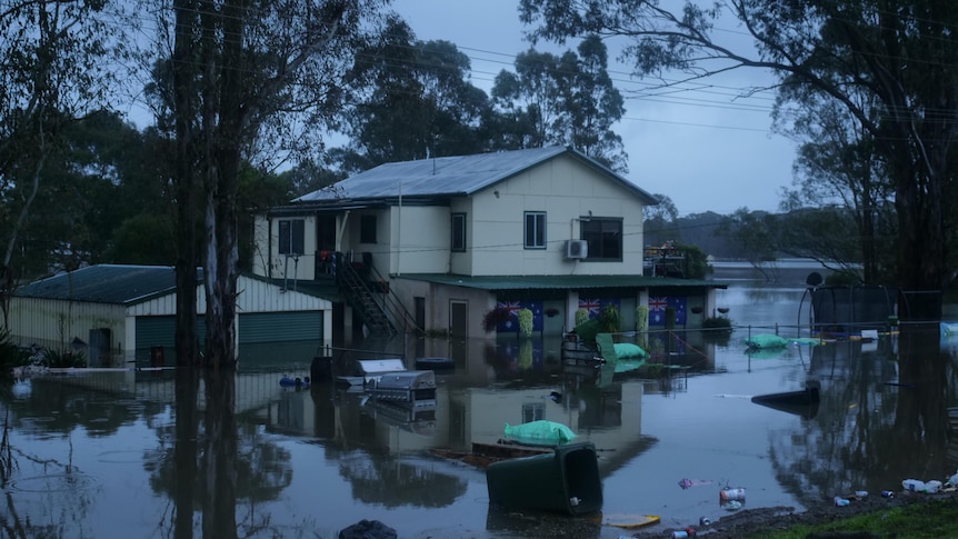 A home that has been inundated in a flood.