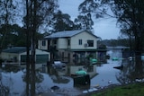 A home that has been inundated in a flood.