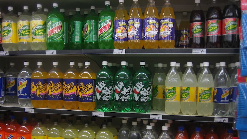 Soft drinks on shelves in a Woolworths supermarket in Australia.