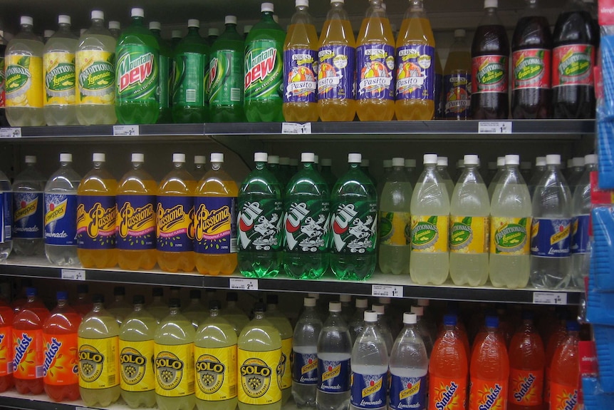 Soft drinks on shelves in a Woolworths supermarket in Australia.