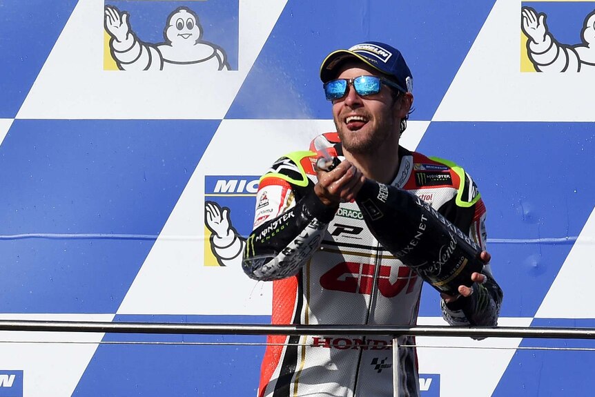 Cal Crutchlow celebrates his Australian MotoGP win