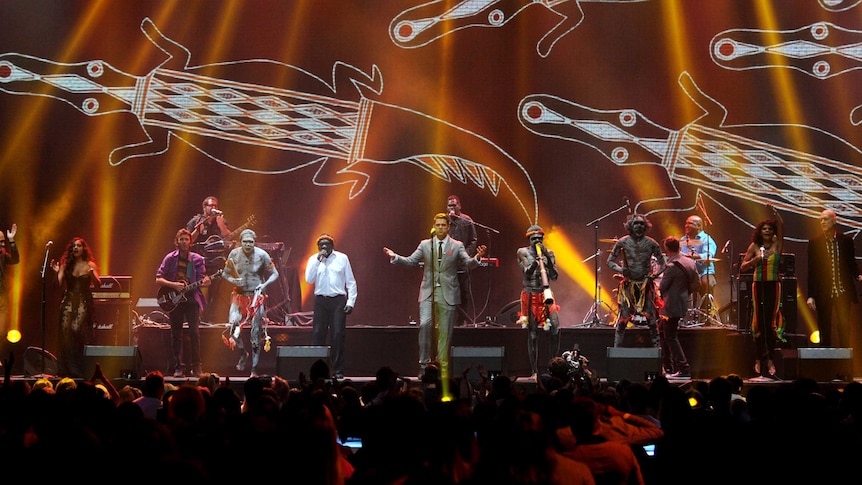 Paul Kelly, Jessica Mauboy, Dan Sultan, Andrew Farriss and Peter Garrett perform with Yothu Yindi at the 2012 ARIAs.