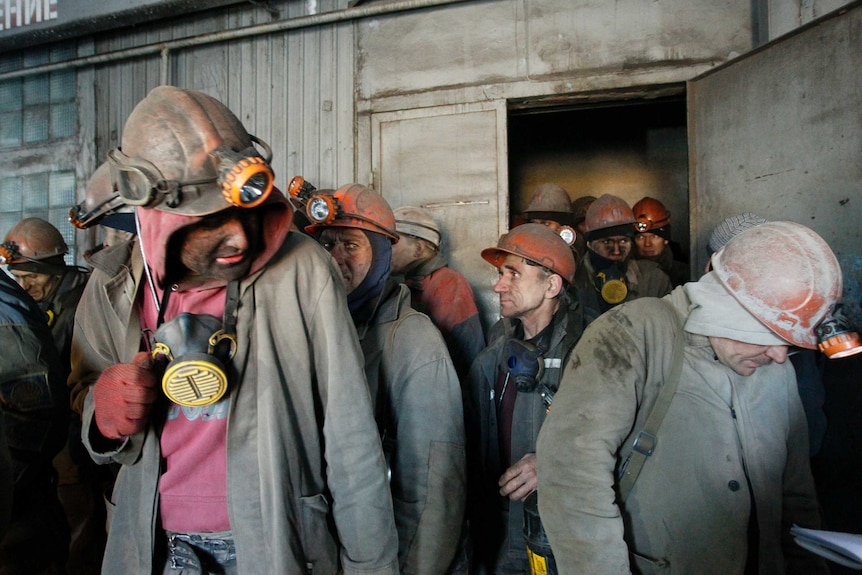 Miners are evacuated from under the Zasyadko mine after shelling caused a power-cut in the rebel-held city of Donetsk.