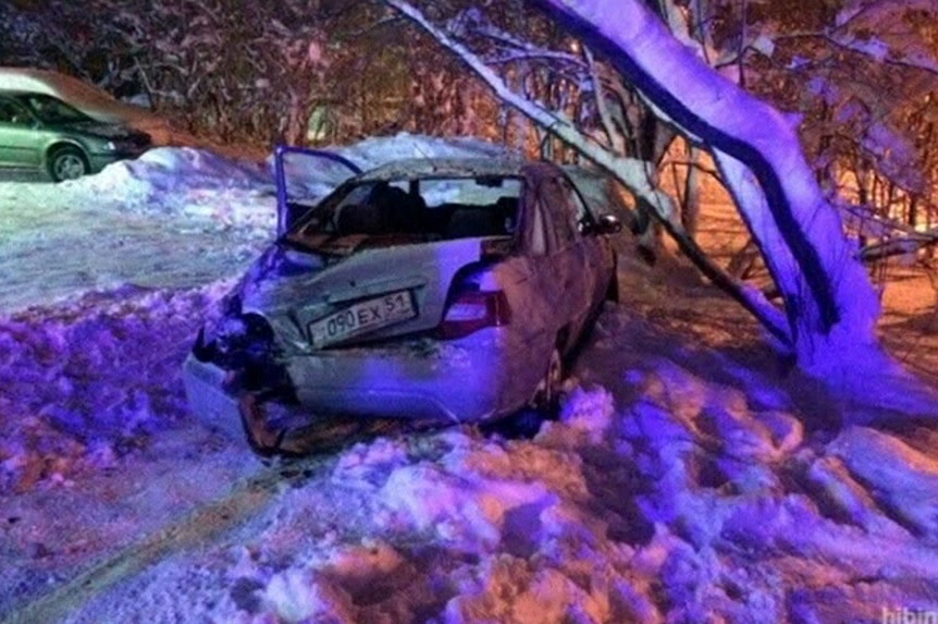 Crushed car in snow