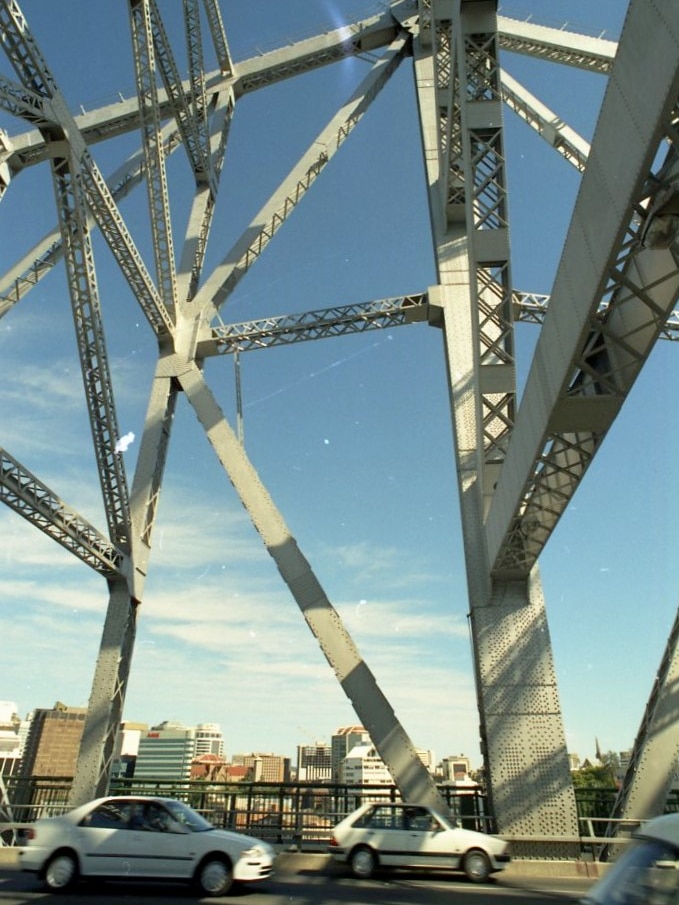A 1994 photo of the story bridge showing ladders added to it for workmen to climb up