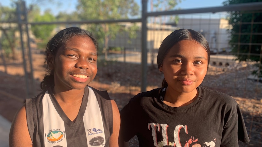 Two young Indigenous school girls at the Howards Springs quarantine facility.