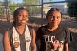 Two young Indigenous school girls at the Howards Springs quarantine facility.