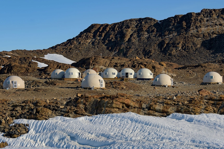 Dome-looking camping pods at a campsite on Antarctica.