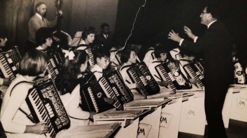 Black and white image of accordion school concert