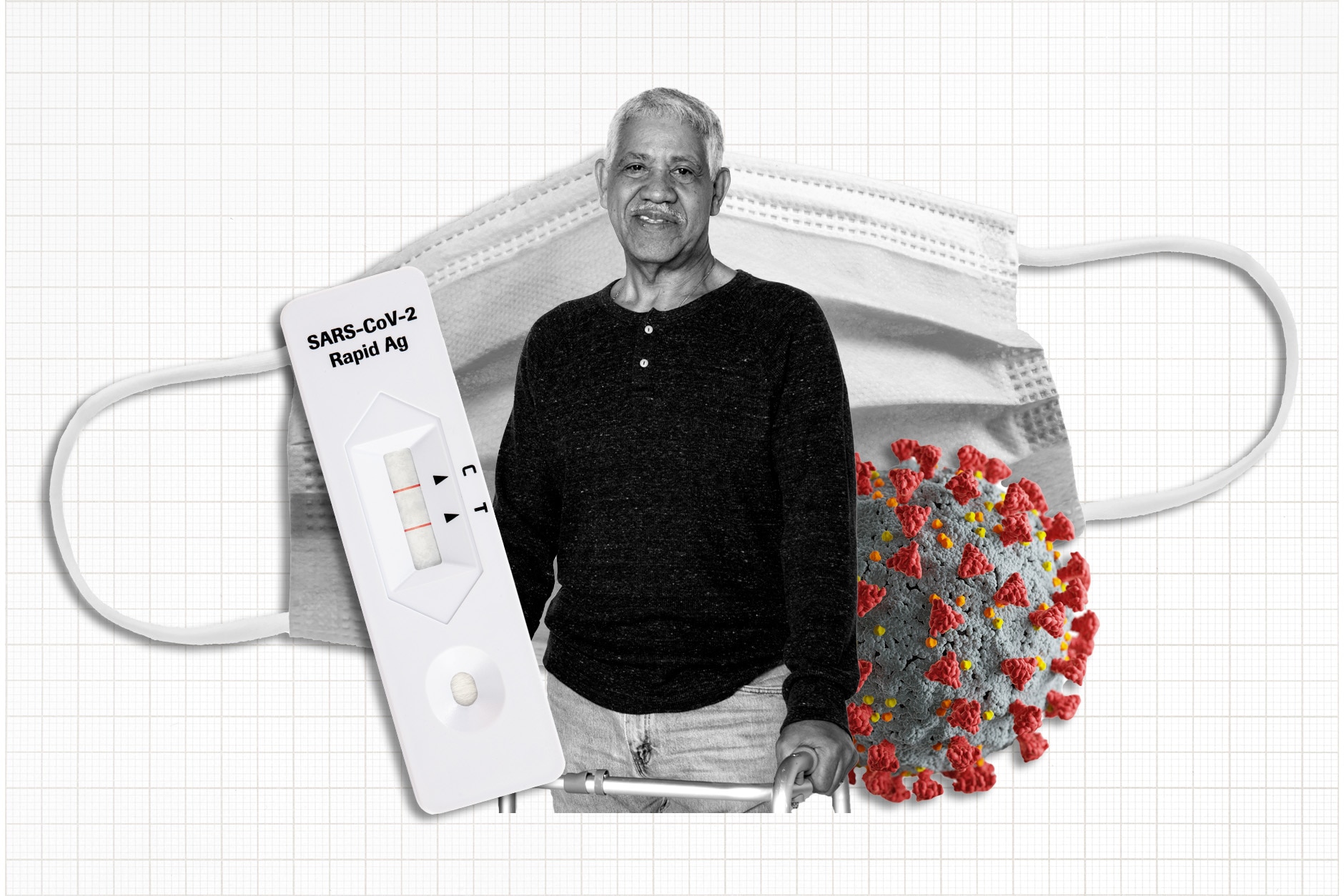 A man stands in front of COVID-19 related illustrations. 