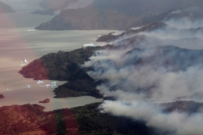 Smoke pours from a wildfire in the Chilean Torres del Paine national park.