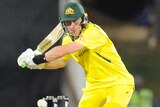 An Australian male batter prepares to hit the ball in an ODI against South Africa.