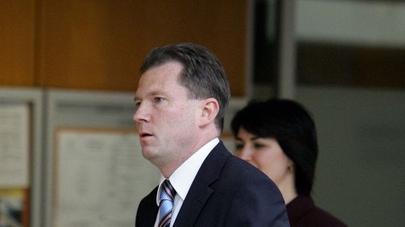 Nathan Rees walks with party colleague Carmel Tebbutt