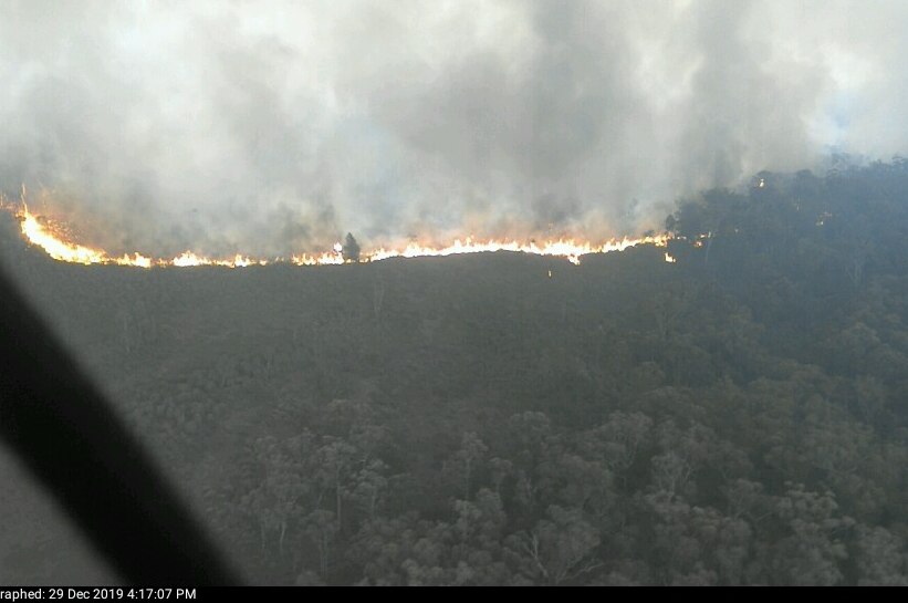 An aerial shot showing fires burning in bushland in East Gippsland.