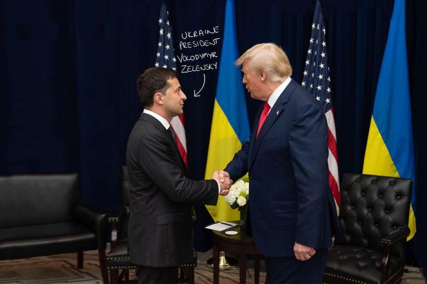 Donald Trump shakes hands with Ukraine President Volodymyr Zelensky