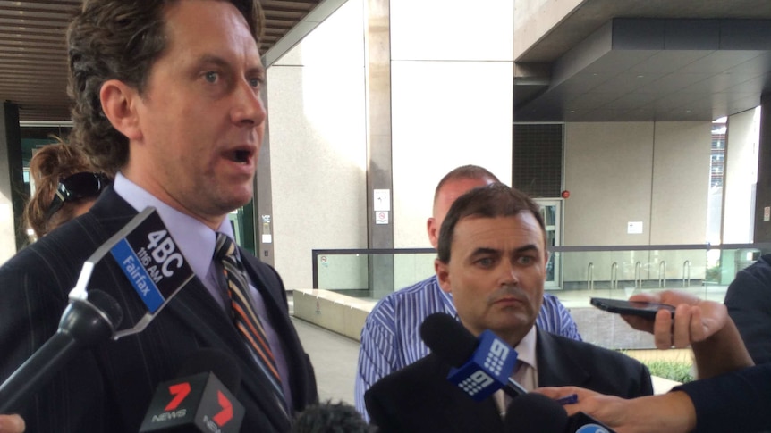 Lawyers Zeke Bentley (left) and David Stevenson outside the Brisbane Magistrates Court today.