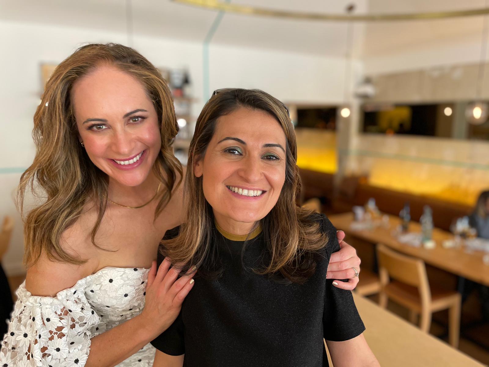 Dina Rosendorff and Patricia Karvelas both smile and pose for a photo