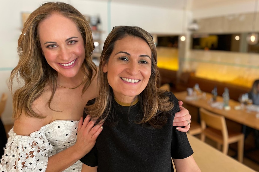 Dina Rosendorff and Patricia Karvelas both smile and pose for a photo