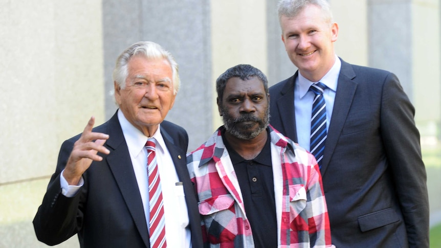 Former Prime Minister Bob Hawke, traditional owner Jeffrey Lee and Environment Minister Tony Burke.