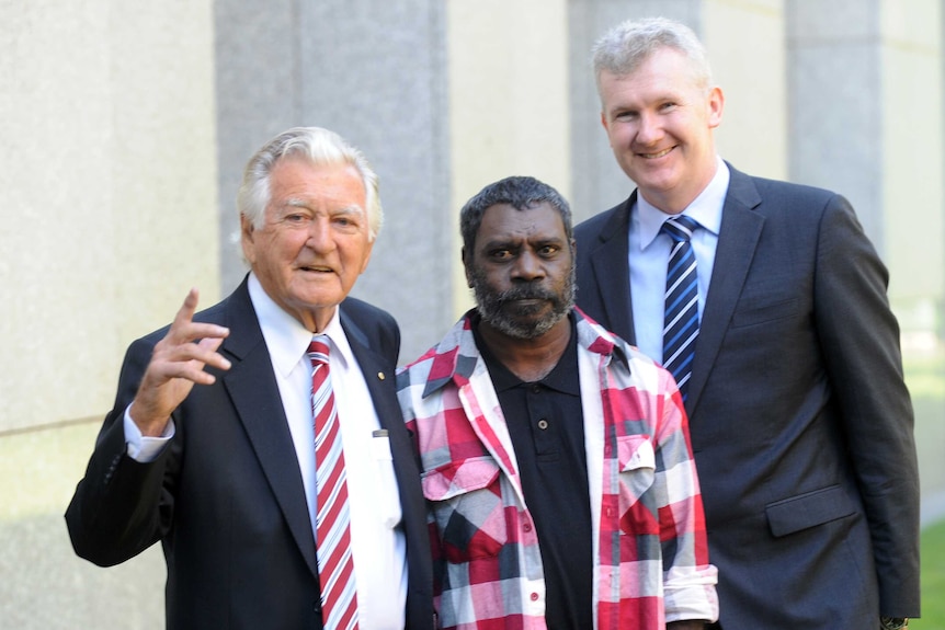 Former Prime Minister Bob Hawke, traditional owner Jeffrey Lee and Environment Minister Tony Burke.