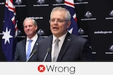 Scott Morrison speaking with Richard Colbeck out of focus behind. Verdict: wrong with a red cross