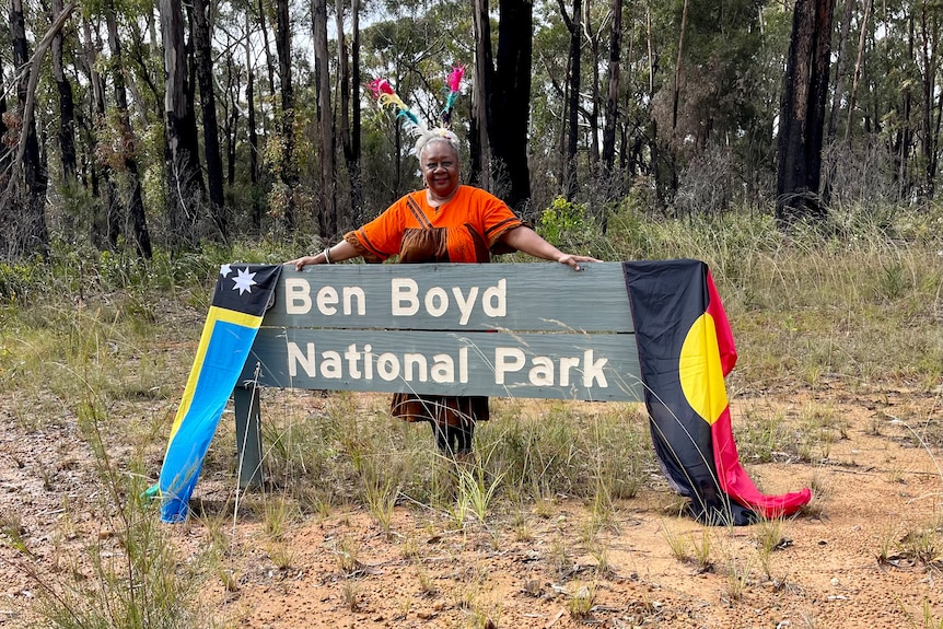 Woman standing behind a Ben Boyd National Park sound.