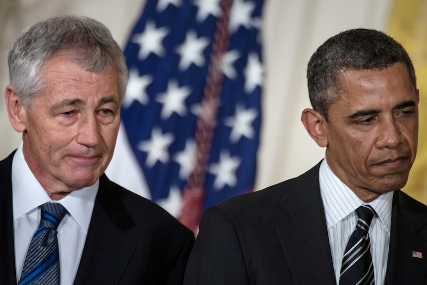 Chuck Hagel (L) and US president Barack Obama (R) attend an event at the White House on January 7.