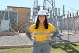 Chanelle Olive standing in front of a sub-station