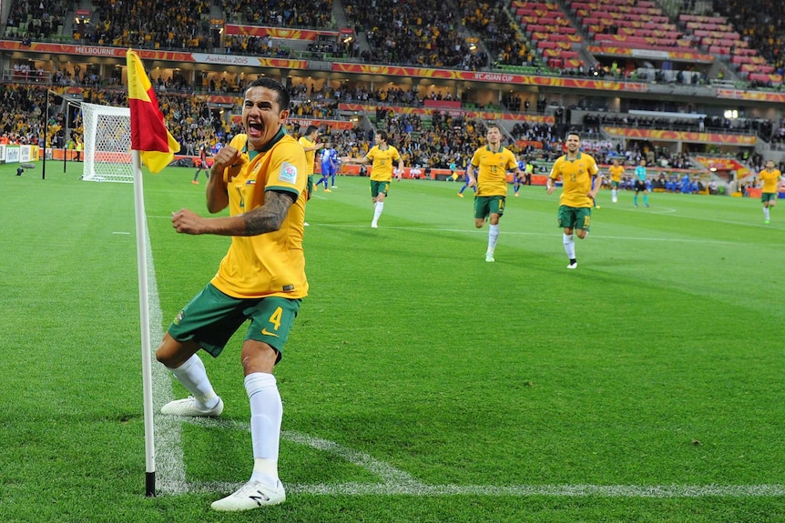 Tim Cahill celebrates his goal against Kuwait