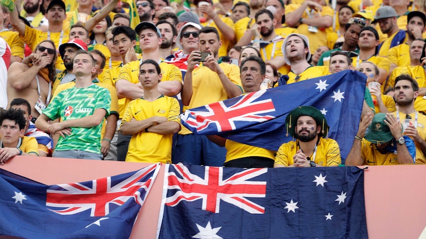 Australian supporters react during the group C match between Australia and Peru at the World Cup.