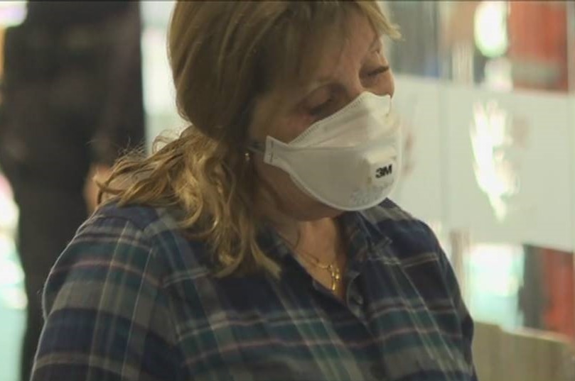 Passenger at airport wearing a mask