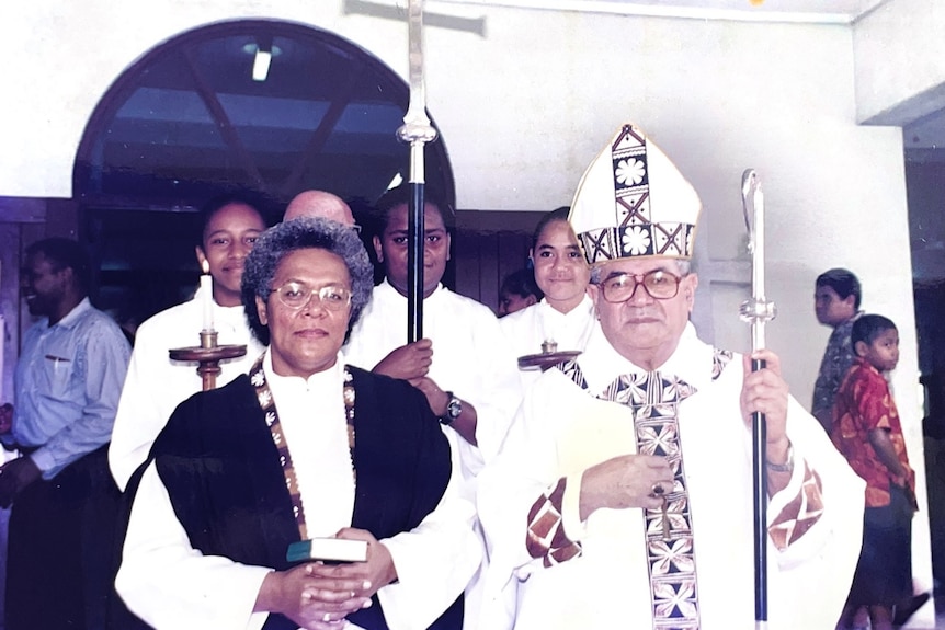 Reverend Sereima Lomaloma walks in a procession with the bishop and other clergy.