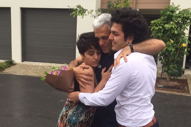 Mojgan Shamsalipoor hugs family and husband