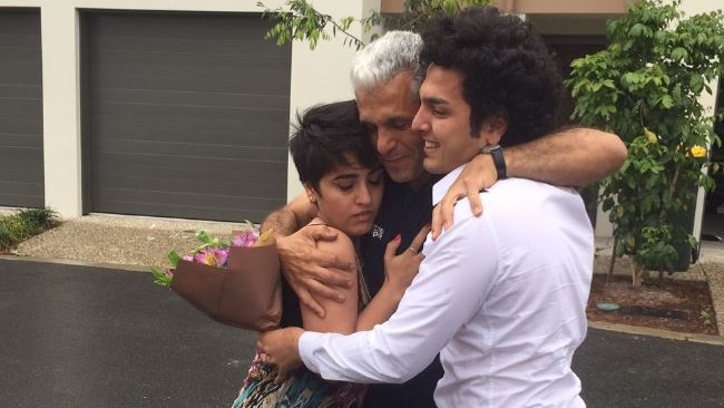 Mojgan Shamsalipoor hugs family and husband