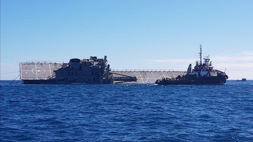 ex_HMAS Tobruk on its side in the ocean
