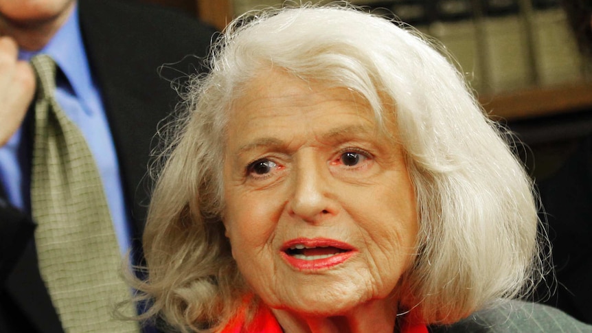 A close up of Edith Windsor looking pleased.