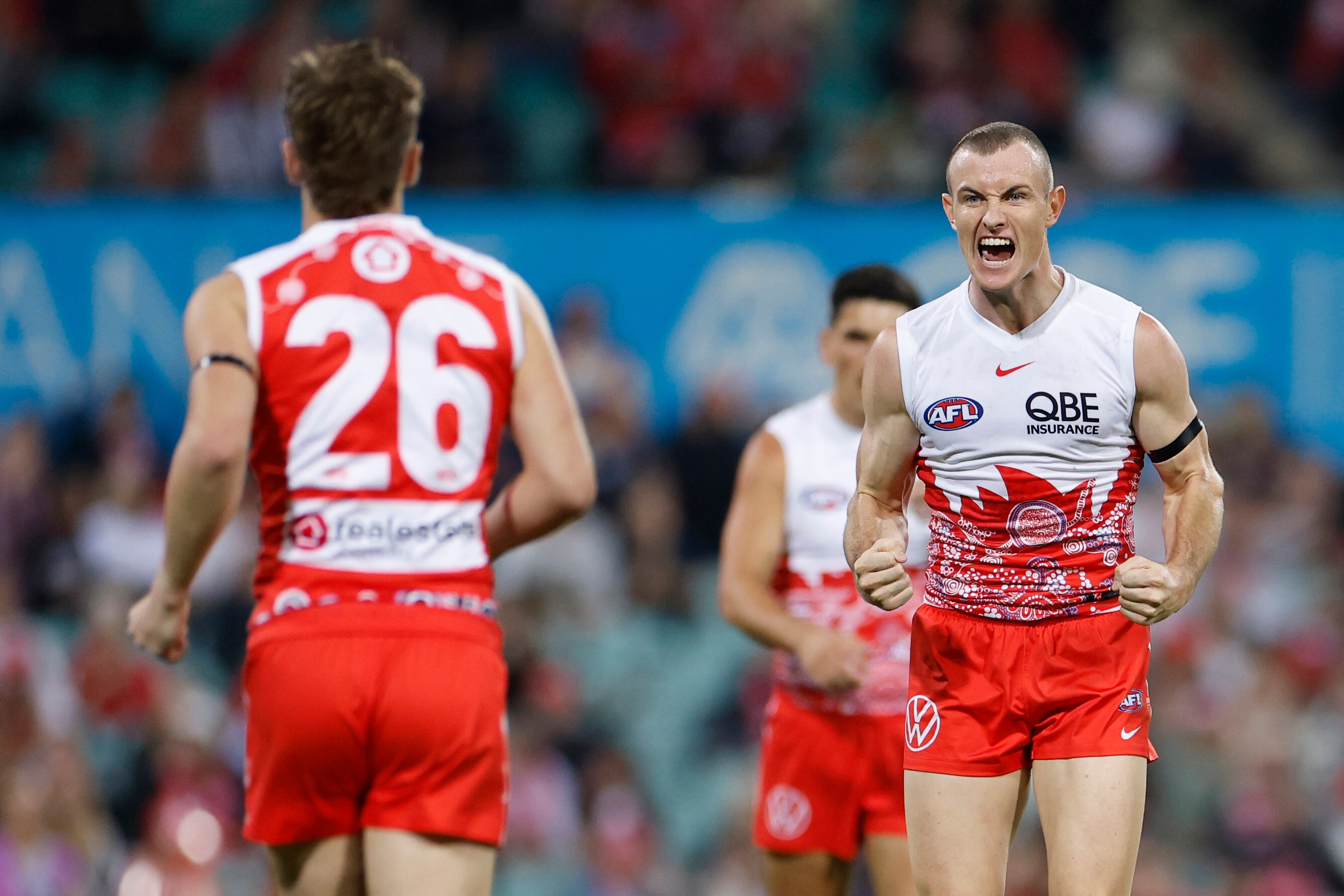 Chad Warner pumps his fists in celebration of a goal for Sydney