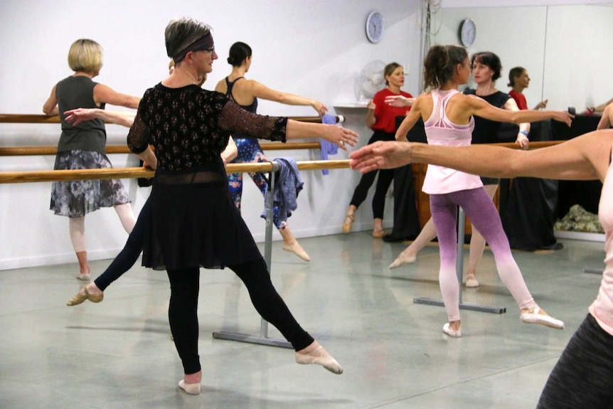 Ms Dobinson finishes the final portion of barre work.