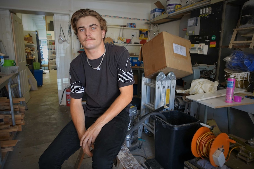 Callum Marriot sits in the Casino workshop.