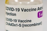 A vial of a vaccine.